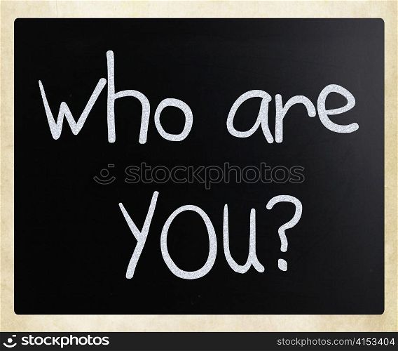 ""Who are you" handwritten with white chalk on a blackboard"