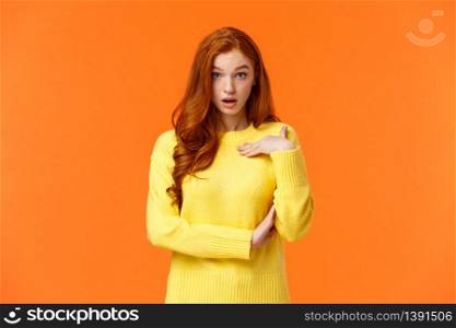 Who me. Frustrated and shocked, confused redhead woman accused, pointing herself and gasping stare astounded, feeling hurt person blame her, receive accusations, orange background.. Who me. Frustrated and shocked, confused redhead woman accused, pointing herself and gasping stare astounded, feeling hurt person blame her, receive accusations, orange background