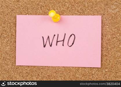 Who word written on paper and pinned on cork board