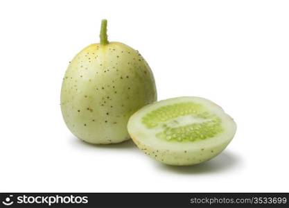Whole and half Apple cucumber on white background