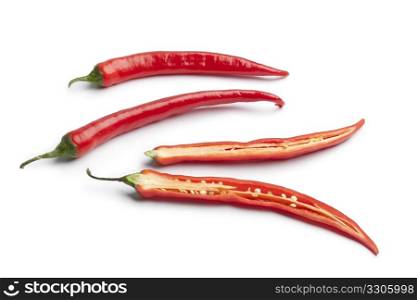 Whole and half fresh red pepper
