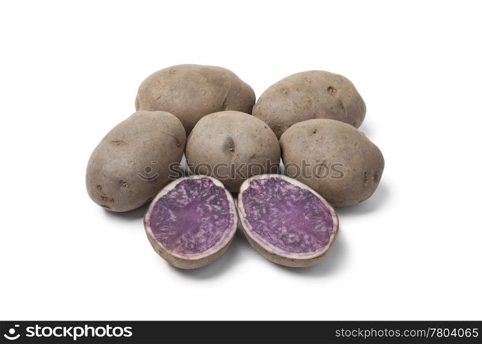 Whole and half Truffle potatoes on white background
