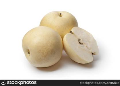 Whole and partial Nashi pear isolated on white background