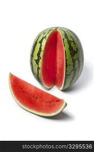 Whole and partial water melon on white background