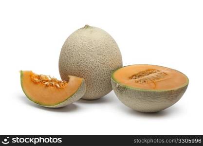 Whole and sliced Cantaloupe melon isolated on white background