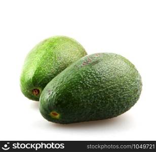 Whole avocado isolated on white background. The avocado or Persea Americana is a fruit that belongs to the family of Lauraceae.