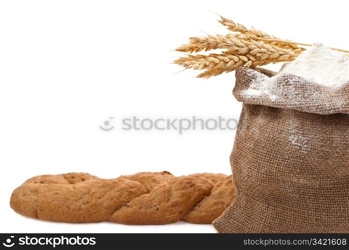 Whole flour with wheat ears and bread