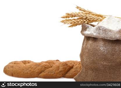 Whole flour with wheat ears and bread