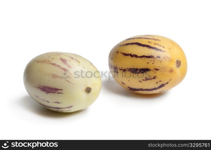 Whole fresh Pepino fruit on white background