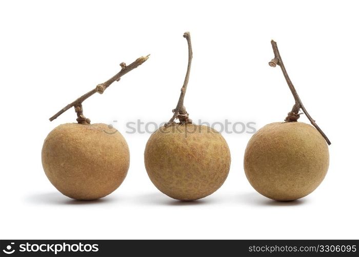 Whole longan fruit with stems