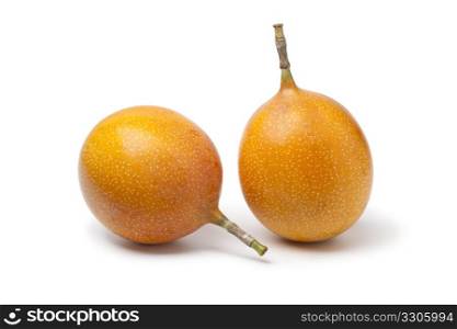 Whole orange passion fruit isolated on white background