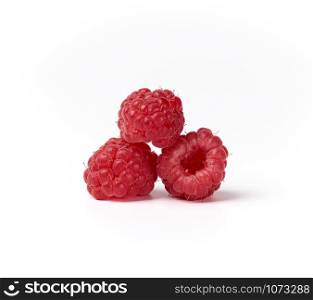 whole ripe red raspberries on a white background, summer berry