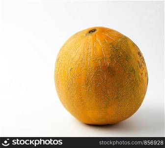whole ripe yellow melon on a white background, summer fruit, close up