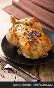 whole roasted chicken with pepper and thyme