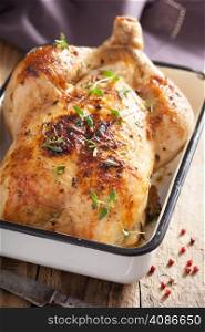 whole roasted chicken with pepper and thyme