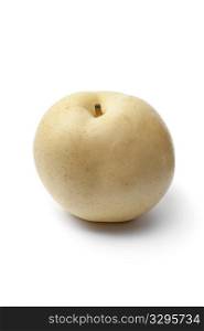 Whole single Nashi pear isolated on white background