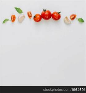 whole slice cherry tomatoes garlic clove basil white background. High resolution photo. whole slice cherry tomatoes garlic clove basil white background. High quality photo