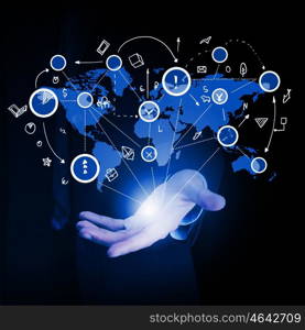Whole world in hands. Close up of businessman hand showing digital connection concept