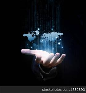 Whole world in hands. Close up of businessman hand showing digital planet