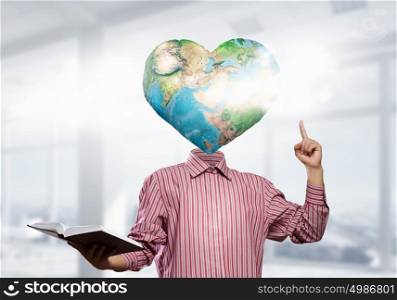 Whole world in his head. Businessman with globe for head. Elements of this image are furnished by NASA