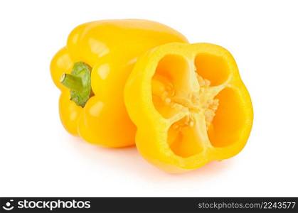 Whole yellow bell peppers and half isolated on white background.