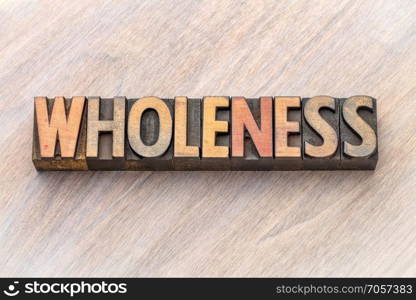 wholeness word abstract in vintage wood type. wholeness word abstract in vintage lettepress wood type printing blocks