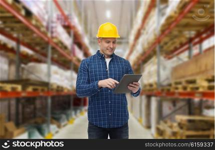 wholesale, logistic, business, export and people concept - happy man or manager with tablet pc computer checking goods over warehouse background
