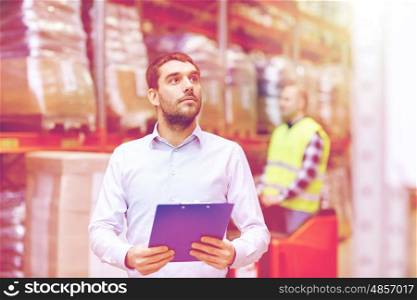 wholesale, logistic, business, export and people concept - man or manager with clipboard checking goods at warehouse over loader on forklift