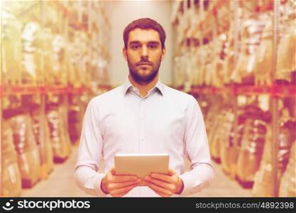 wholesale, logistic, business, export and people concept - man or manager with tablet pc computer at warehouse
