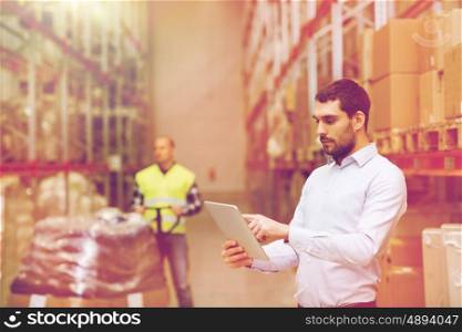 wholesale, logistic, business, export and people concept - man or manager with tablet pc computer checking goods at warehouse