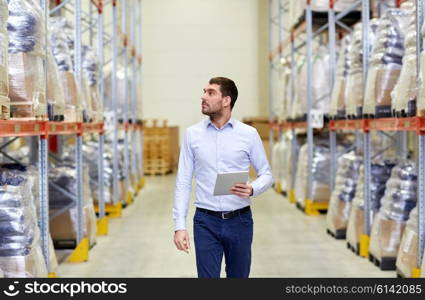 wholesale, logistic, business, export and people concept - man or manager with tablet pc computer checking goods at warehouse