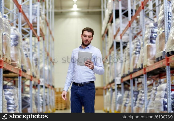 wholesale, logistic, business, export and people concept - man or manager with tablet pc computer checking goods at warehouse