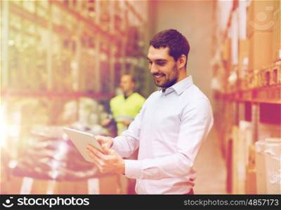 wholesale, logistic, people and export concept - happy businessman or supervisor with clipboards at warehouse