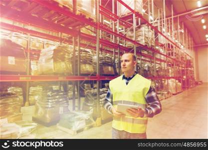 wholesale, logistic, technology, shipment and people concept - man or manual worker with tablet pc at warehouse