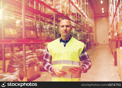 wholesale, logistic, technology, shipment and people concept - man or manual worker with tablet pc at warehouse