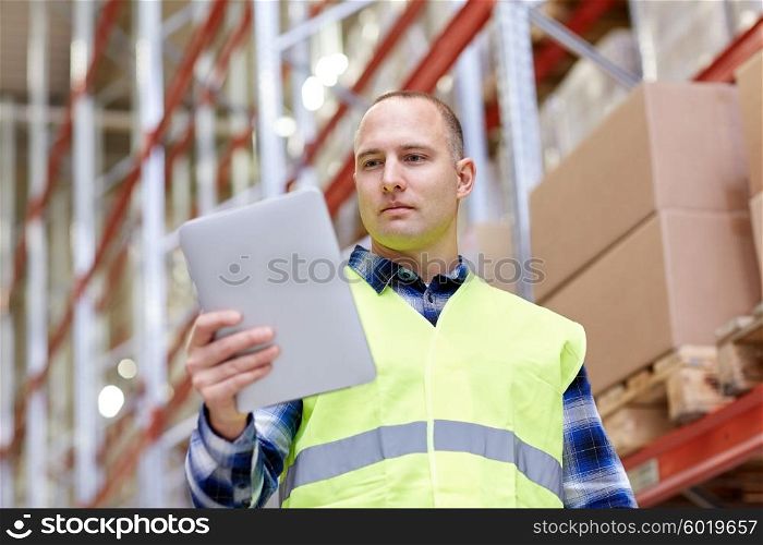 wholesale, logistic, technology, shipment and people concept - man or manual worker with tablet pc at warehouse