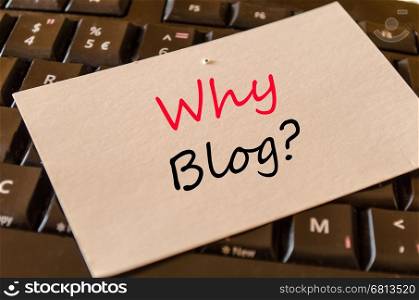 Why blog text concept on white memo and dark keyboard background