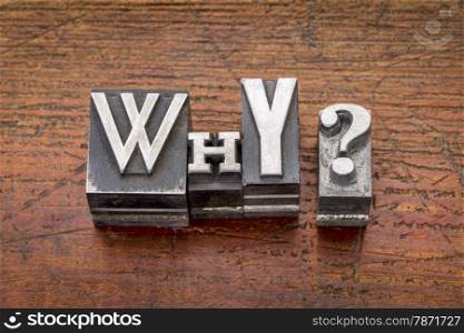 why question i in mixed vintage metal type printing blocks over grunge wood