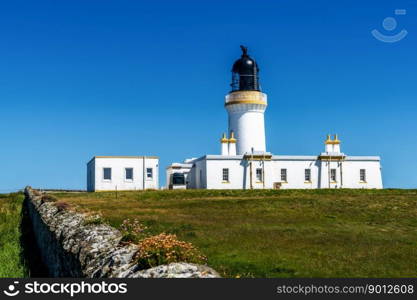 Wick, United Kingdom - 26 June, 2022: view of the Noss Head Lighthouse in Caithness in the Scottish Highlands