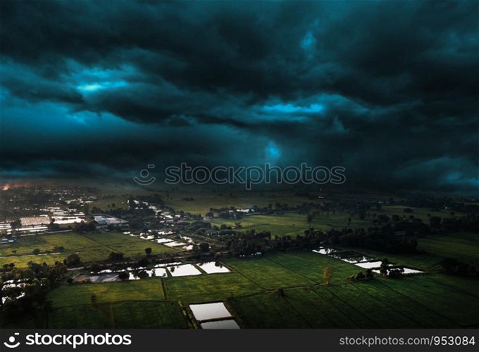 wide angle of agriculture farm and hill from high view shooting and storm cloud