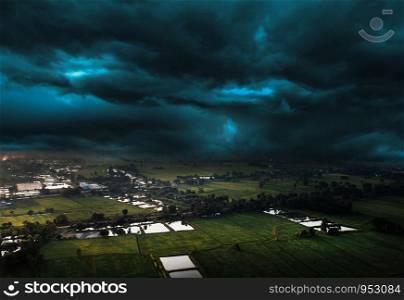 wide angle of agriculture farm and hill from high view shooting and storm cloud