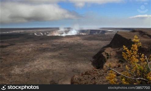 Wide angle of the crater at Kilauea in Hawaii as steam vents out