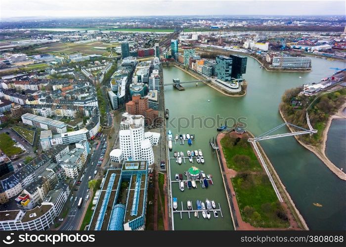 Wide angle picture of river Rhine, Duesseldorf. Seen from the television tower Rheinturm, Germany . Duesseldorf mediahafen (harbour) in Rheinland-Westphalia