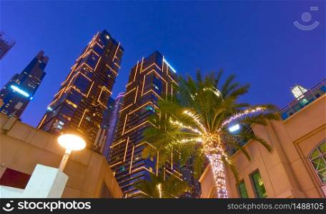 Wide angle shot of towers of Dubai Marina at night, United Arab Emirates