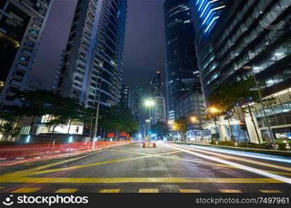 Wide angle view asphalt road on night scene with modern city .