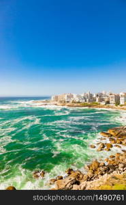 Wide angle view of Bantry Bay and apartments in Cape Town South Africa