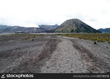 Wide dirty road to Botok and Bromo volcanoes, Indonesia