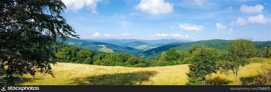 Wide panorama of a idyllic mountain landscape on a sunny day in the morning