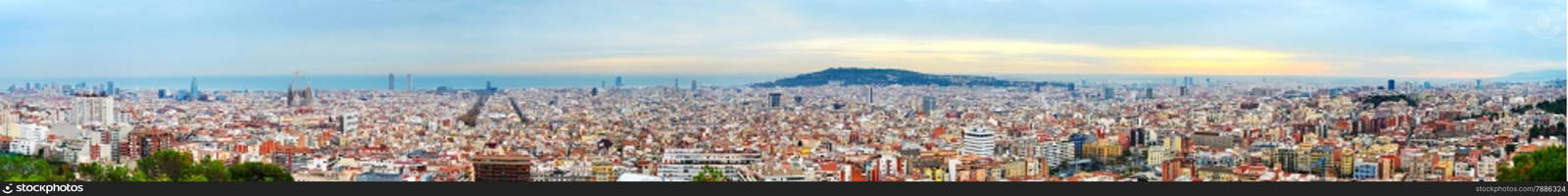 Wide panoramic view of Barcelona at beautiful sunset. Spain