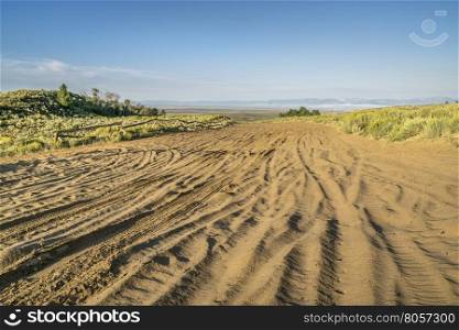 wide sandy road in North Sand Hills, only place in Colorado to legally ride on sand dunes